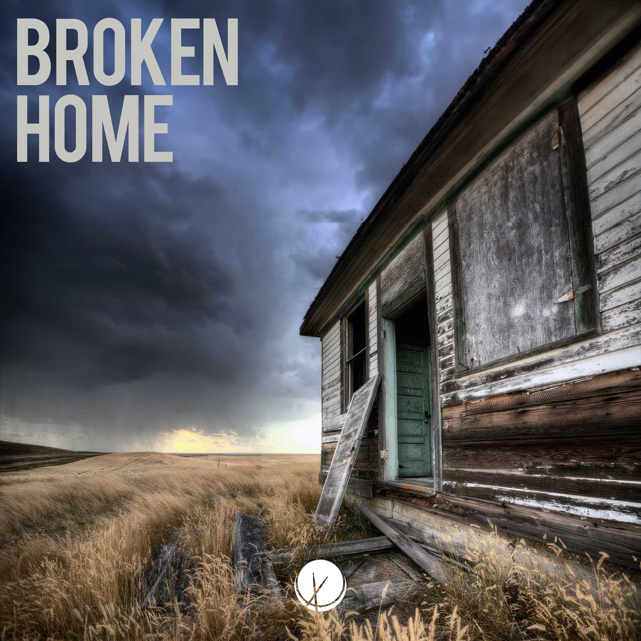 Image depicting a broken home, showcasing an old abandoned house in a field of wheat under dark and cloudy weather. Title: "Broken Home."