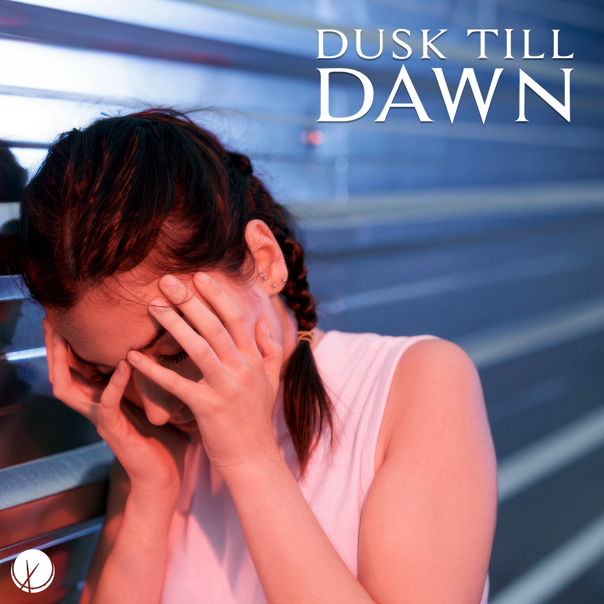 Dusk Till Dawn: Woman with braided hair, burying her face in hands, displaying a sad and stressed expression, captured by a metallic gate.