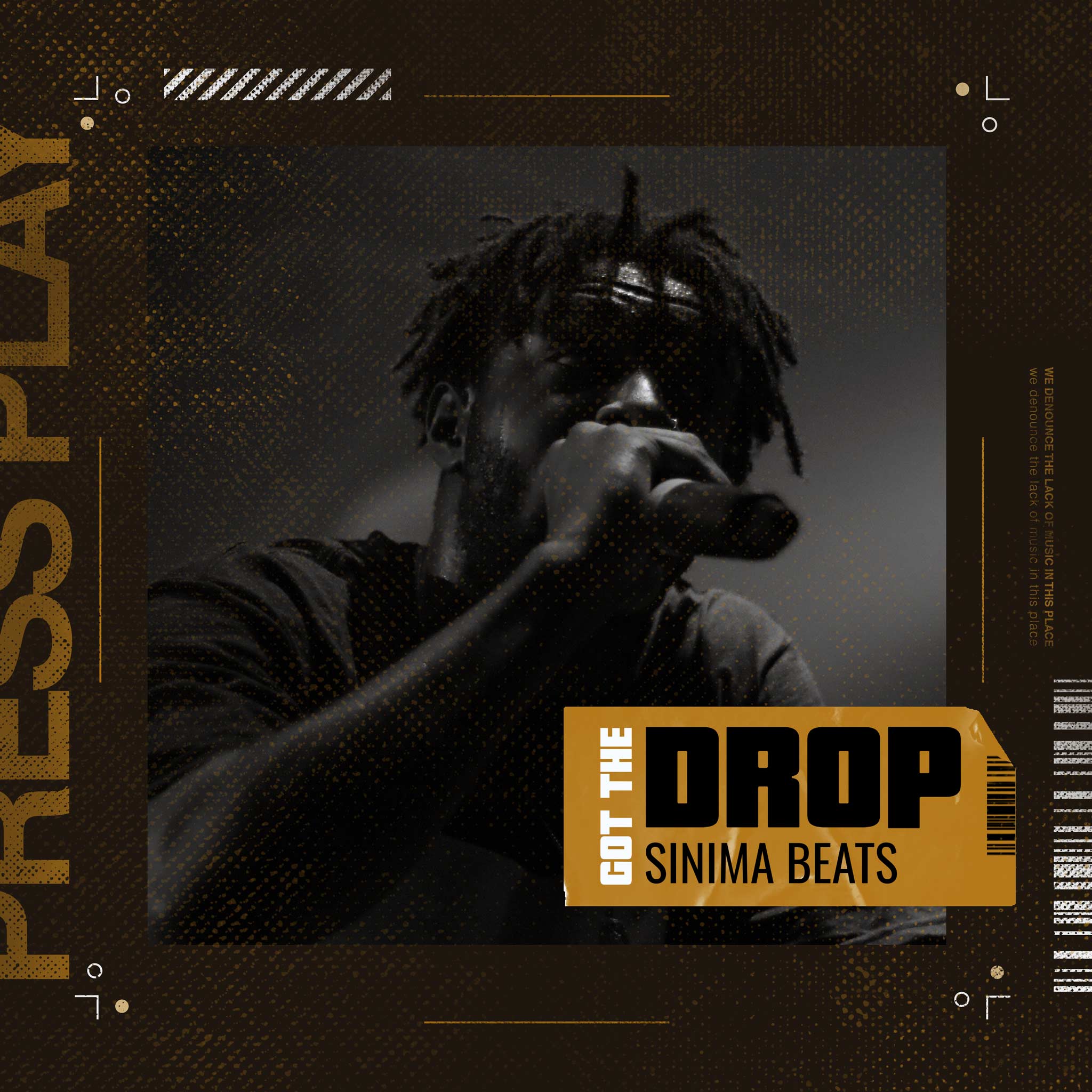 Got-the-Drop: Rapper Holding Microphone in Close-Up, Dreads, Dark Colors - Hip Hop Cover Art.