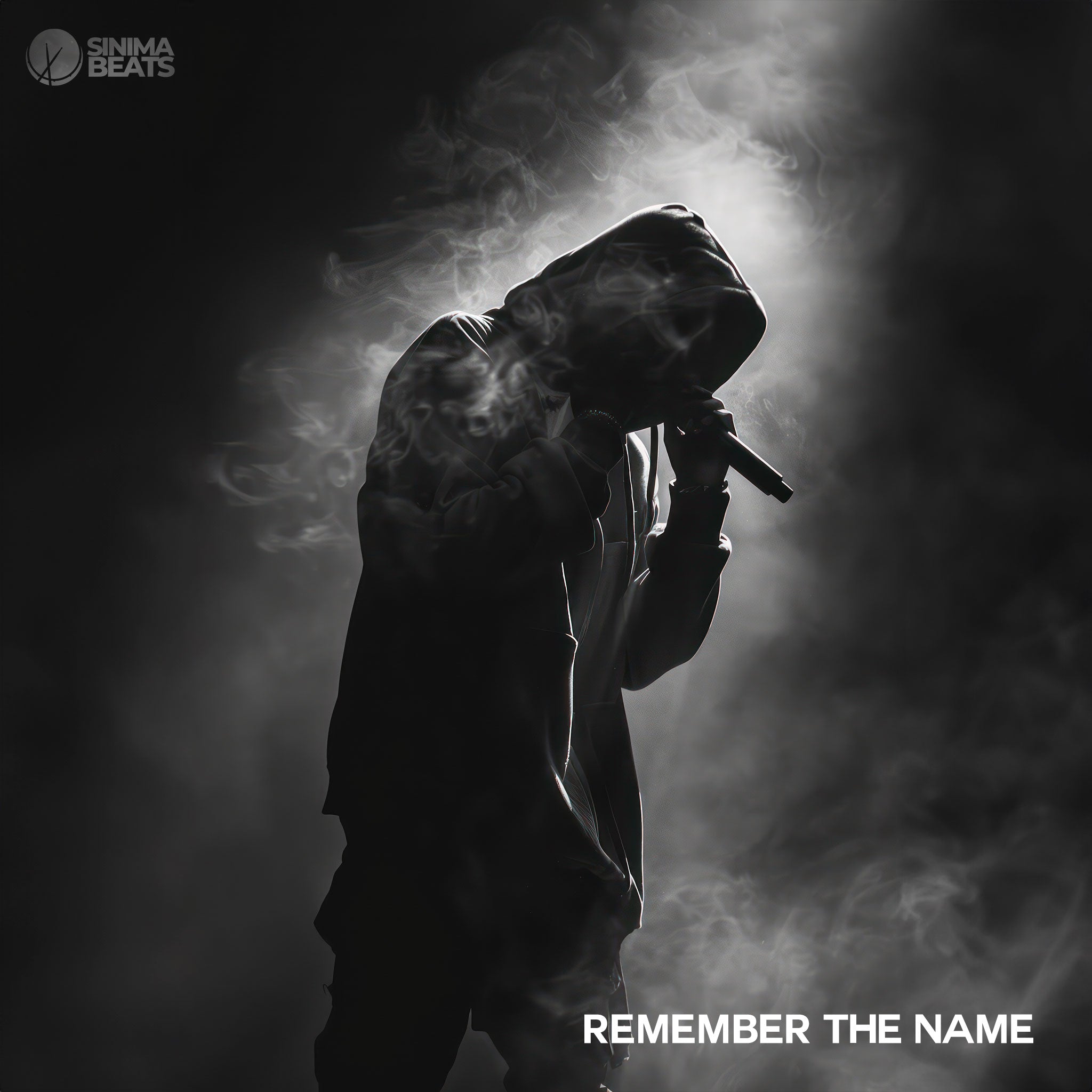 ‘Remember the Name’ features a rapper performing in an intense scene, surrounded by fog with subtle light emanating around him. The grayscale image enhances the dramatic and focused atmosphere of the performance.