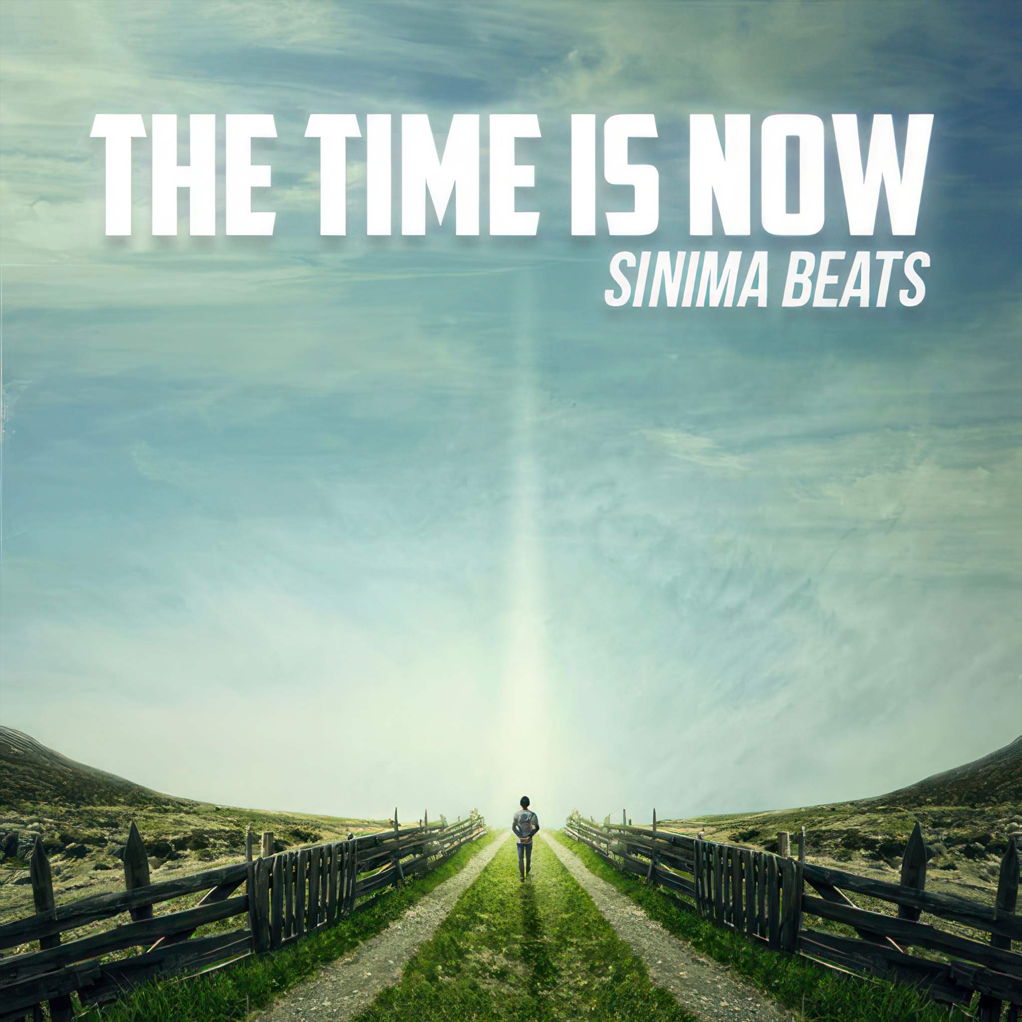 "The Time is Now" - Man Walking in the Distance Under a Blue Sky