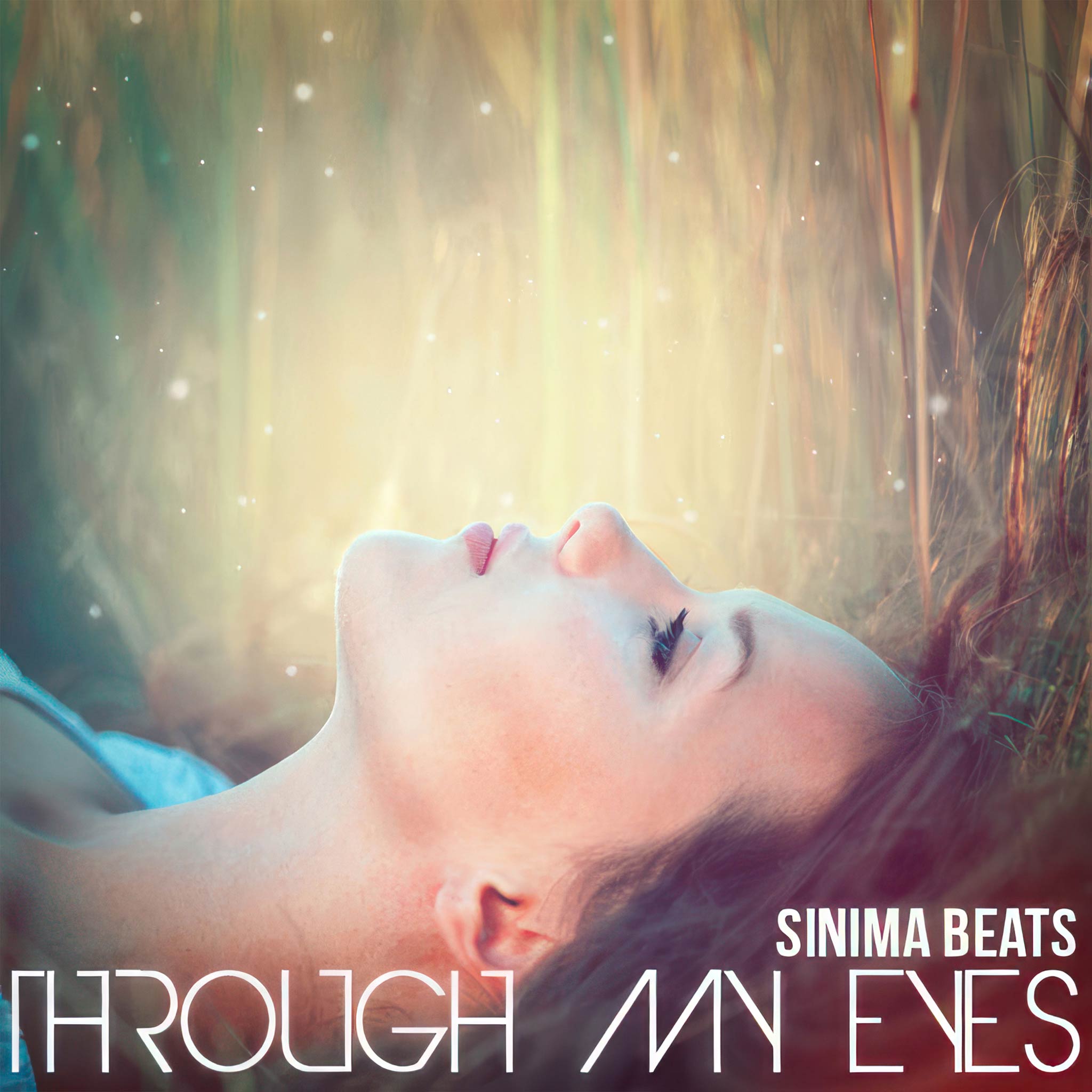 "Through My Eyes" - Woman Laying on Her Back, Close-Up of Her Face, Surrounded by Tall Wheat and Light Particles