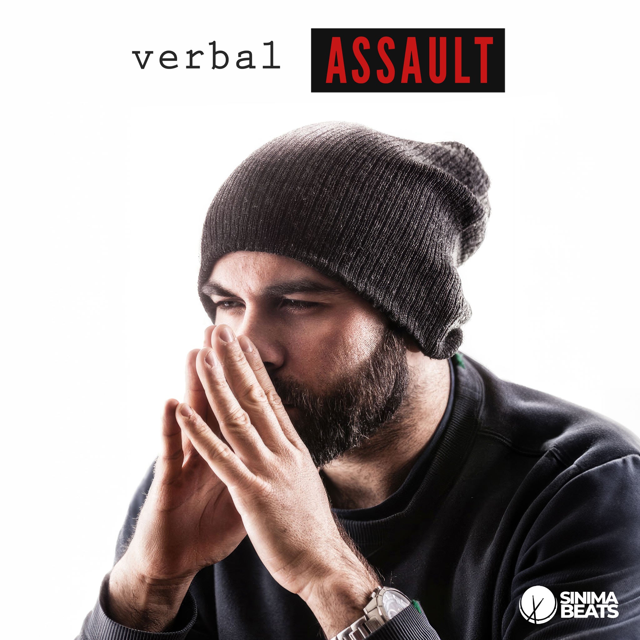 
Bearded Rapper Wearing Gray Sweater and Beanie Cap Posing with Fingers Pressed Together in State of Deep Contemplation - Verbal Assault