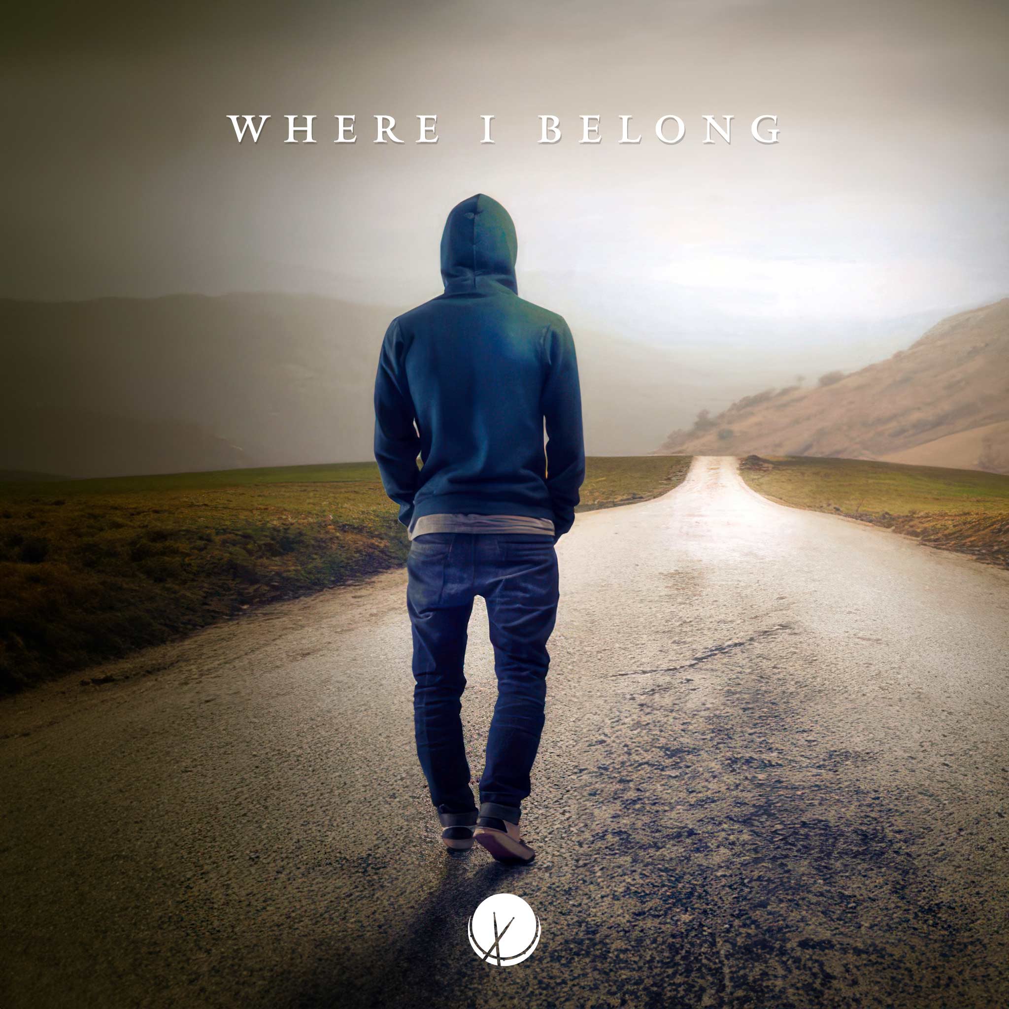 Man in Hoodie Walking on a Lone Road with a Distant Journey - Where I Belong